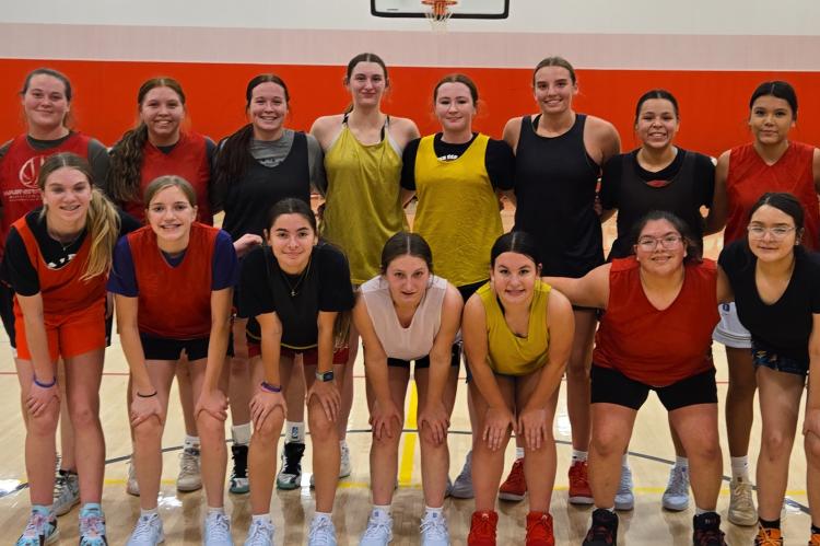 Team members are, back row from left: Coach Koupal, Genesis Patterson, Braelyn Scott, Katrina Zephier, Lydia Yost, Ravyn Medricky, Hannah Holzbauer, Ashlyn Koupal, Hayden Fischer, Mateya Bruguier, Jalise Bruguier, and Coach Hewitt: front row: Olivia Podzi