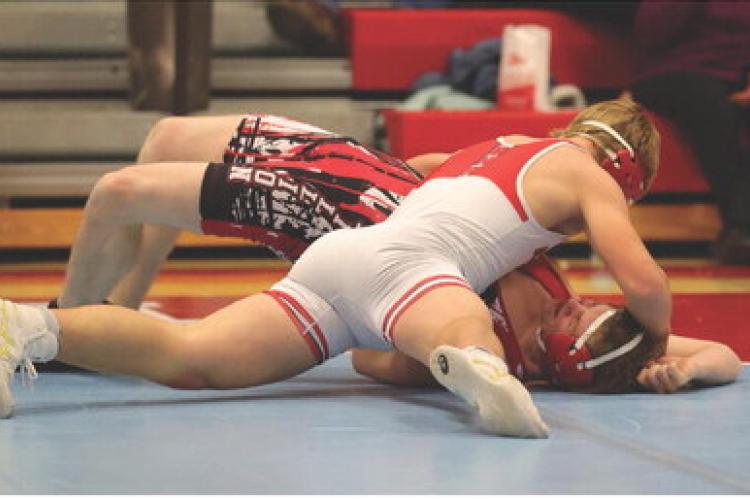 Weston Bierema with the pin on Vermillion opponent at the tourney in Avon on Thursday, December 5th.