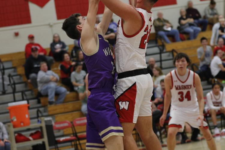 Preston McFayden goes up for the basket. Photography by Denelle