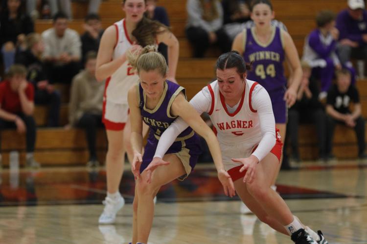 Lydia Yost scrambles for the ball.