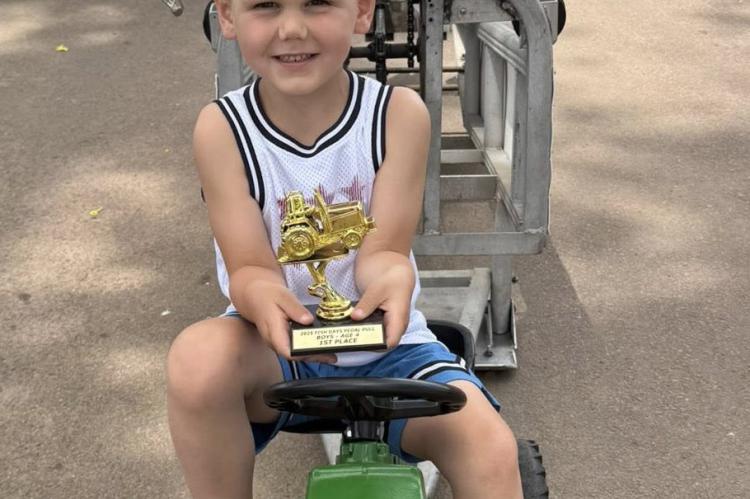 Left: Memphis Hill, son of Mavrick and Amber Hill with his 1st place trophy in the 4-year old division. Congratulations Memphis. Courtesy Photo.