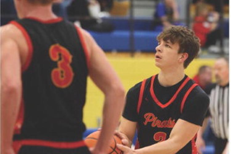 Grayson Ratzlaff prepares to shoot from the free throw line.