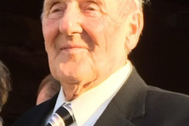ALLEN E. KINDT