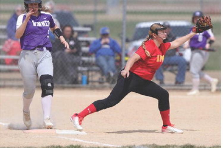 Kaeli Wallinga on 1st base. Photos by Barb Pechous