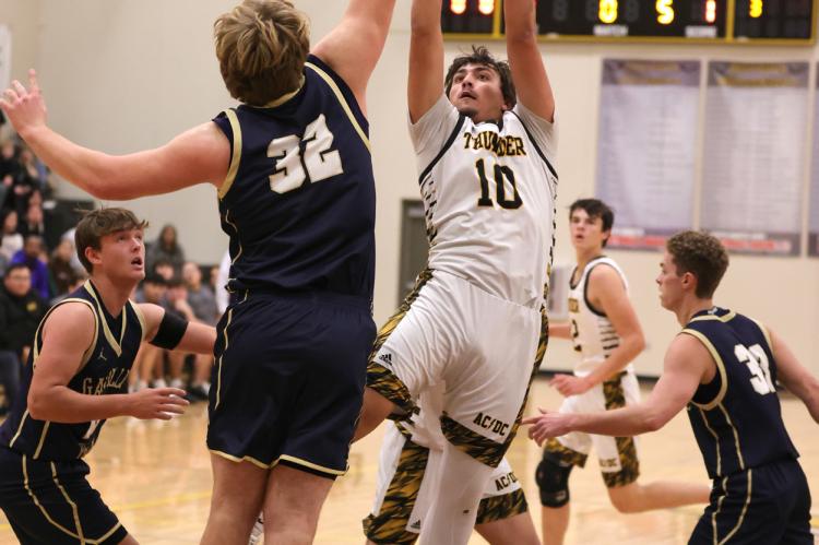 Garth Maas attempts a basket.