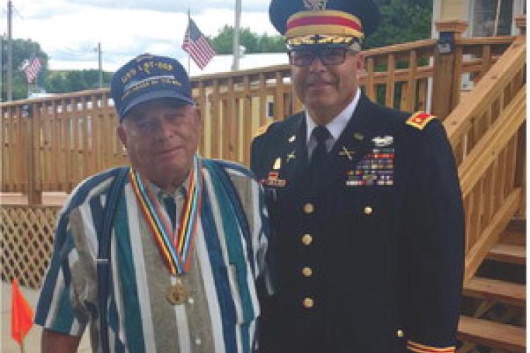 Colonel Yost with his father Herb Yost, at his medal presentation.