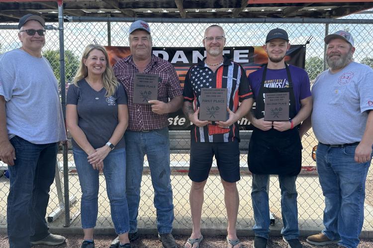 Pictured are, from left: Dante Fireman Jim Beeson, Karen and Curt Soulek, Brad Carda, Jacob Carda, and Dante Fireman Dan Kotab. Photos by Barb Pechous