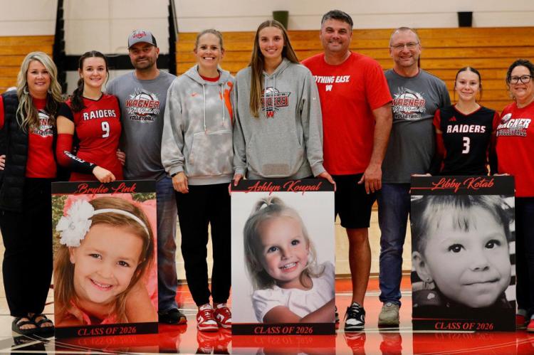 Pictured are, from left: Linsay, Brylie and Todd Link; Tera, Ashlyn and Mike Koupal; Mike, Libby and Jody Kotab. Photo by Denelle. Correction: We apologize for our mistake on the Wagner Volleyball Parents Night caption in the Post last week.