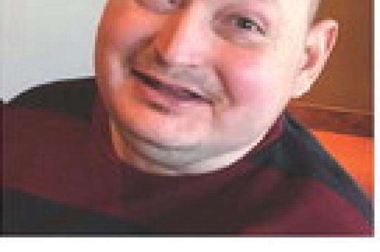 AARON L. WYMAN