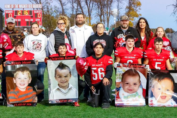 Pictured are, from left: Treyton Drapeau, mom Jennifer Drapeau, Brayden Kreber, parents Mike &amp; Amy Blaha, Kobe Drapeau, parents Galicia Drapeau &amp; Gregg Frederick, Rowdy Meyer, parents Cody Meyer &amp; Stephanie Hoeke, Octavian Kocer, guardians Pat
