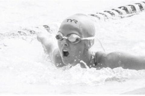 SWIM TEAM COMPETES AT WAGNER MEET