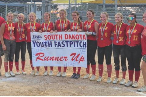 Team members are, from left: Coach Paul Kuhlman, Sydney Johnson, Emersyn Haenfler, Brielle Voigt, Harper Kracht, Rowan Brandt, Raegan Brandt, Addison Lavelle, Kensley DeVries, Whitley Wolf, Johanna Namminga, and Head Coach Macy Voigt. Not pictured Kalia Huempfner. Courtesy Photo