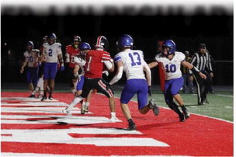 CCaarlos Galiinndo carries the balll tthhroughh tthhee endd zone ass EEPP-J ddeeffeennddeerrss cclloossee iinn.. GGaalliinndoo finishedd wwiitthh five recepttiionss ffoorr 2299 yyaarrddss aanndd aa ttouchdownn iinn tthhe RRaiders'' 227-8 llosss tto tthhe HHuuskies.