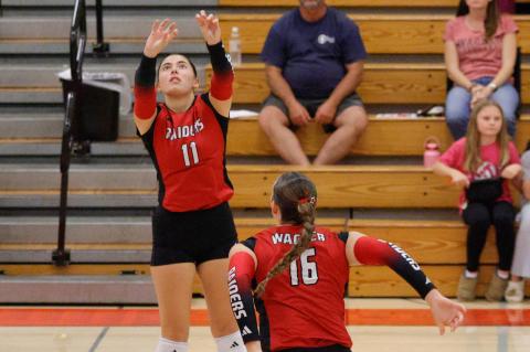 Braxton Nedved with the set as Ravyn Medricky moves in for the kill.