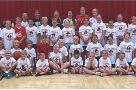 YOUNG ATHLETES LEARN SKILLS AT BASKETBALL CAMP