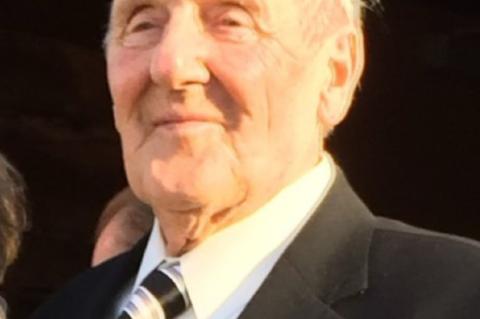 ALLEN E. KINDT