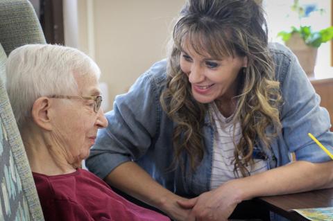Kammy Ellwanger, Director of Nursing, with a resident. Courtesy Photo