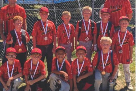 Pictured are back row: Coach Brad Bierema and Coach Gary Frank. Players are: Braxton Schultz, Jorden Ratzlaff, Camden Frank, Ridge Maggs, Brooks Podzimek, and Sawyer Bierema; front row: Corbin Tjeersdma, Maverick Van Gerpen, Daniel Horse, Kinglee Hubbell, and Levi Paulsen. Not pictured is Coach Nathan Schultz. Courtesy Photo