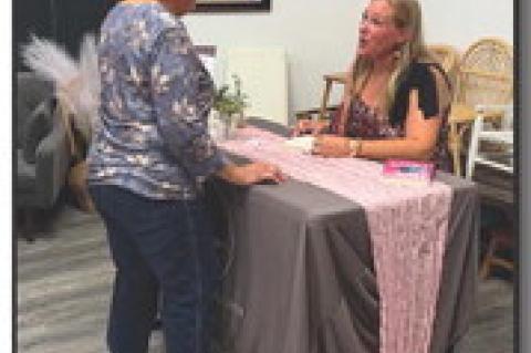 LOCAL AUTHOR CELEBRATES DEBUT NOVEL WITH BOOK SIGNING