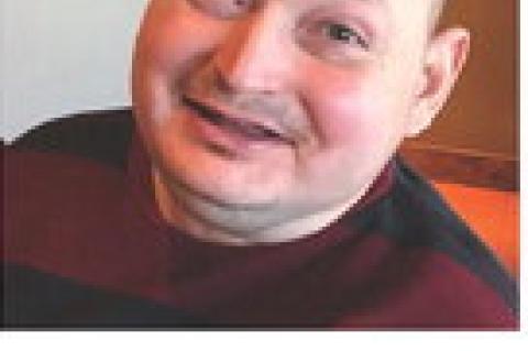 AARON L. WYMAN