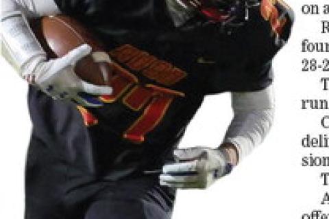 Avon Pirate #27 Braylon Fathke carries the football downfield during Friday night's matchup againsttheCentervilleTornadoes.
