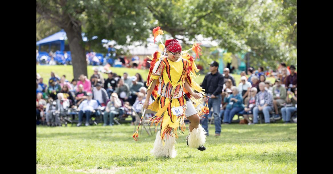 A youth competition dancer performs in traditional regalia during the 2025 St. Joseph's Indian School Powwow in Chamberlain. The annual event celebrates Native American culture through dance, drum groups, and community fellowship. (Photo courtesy of St. Joseph’s Indian School)