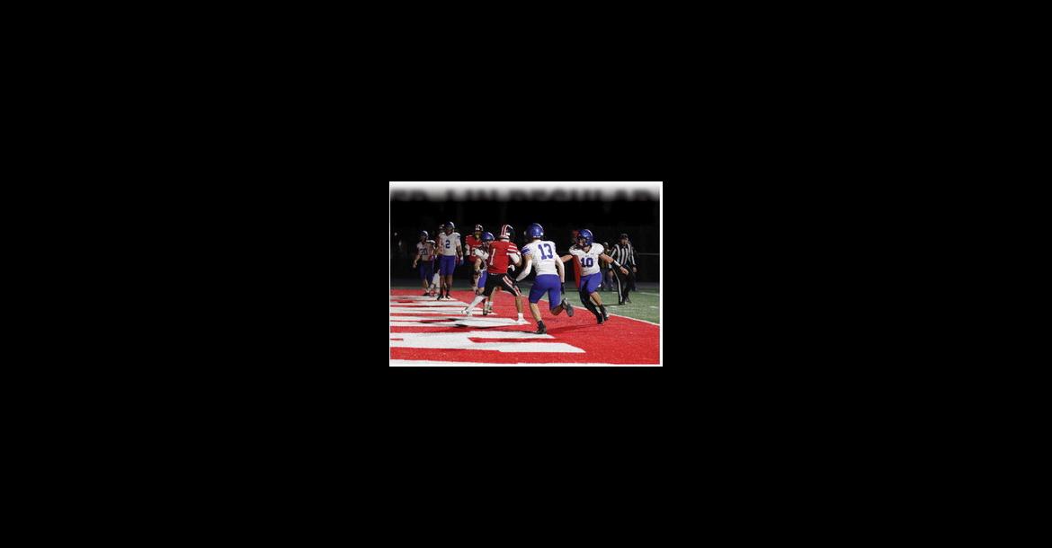 CCaarlos Galiinndo carries the balll tthhroughh tthhee endd zone ass EEPP-J ddeeffeennddeerrss cclloossee iinn.. GGaalliinndoo finishedd wwiitthh five recepttiionss ffoorr 2299 yyaarrddss aanndd aa ttouchdownn iinn tthhe RRaiders'' 227-8 llosss tto tthhe HHuuskies.