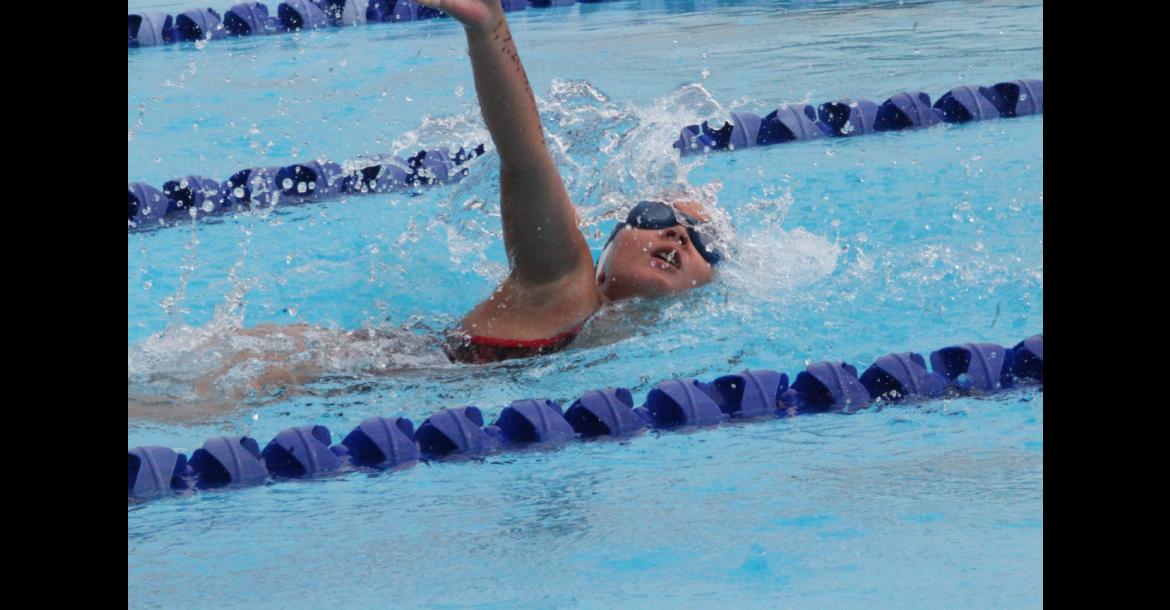 WAVES MAKE A SPLASH AT HOME MEET