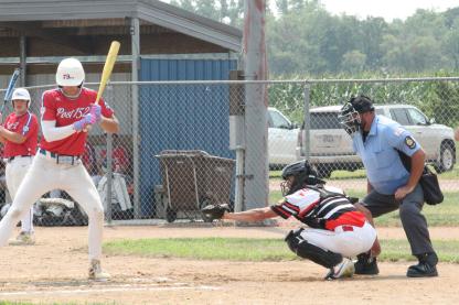 Javian Pesicka had catching duties for the Wagner Junior Legion team in opening tournament action Monday, July 27 at McCormick Park.