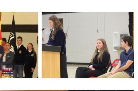 Wagner High School students Emma Kreeger, Kalea Kuhlman, and Matthew Kokes led the program. Kokes also read his Voice of Democracy essay.