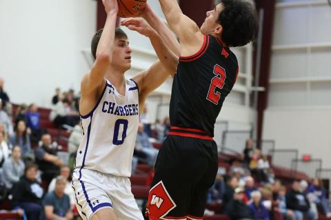 #2 Jesse Zephier with the block. Photos by Barb Pechous