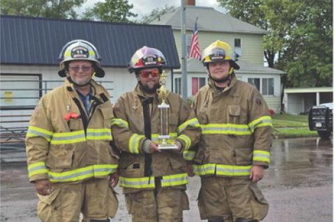 COMMUNITY FATHER-SON AVON FIREFIGHTER TEAM WINS LABOR DAY WATERFIGHT