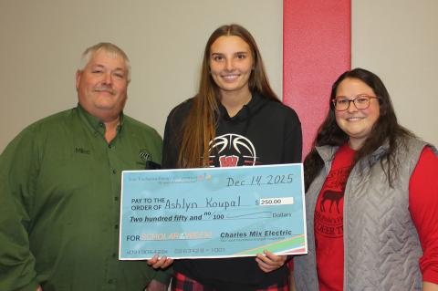 Ashlyn Koupal (center) is pictured with Mike Dangel of Charles Mix Electric and WHS teacher Libby Renbarger, who nominated Ashlyn for the Touchstone Energy Scholar of the Week award. Courtesy Photo
