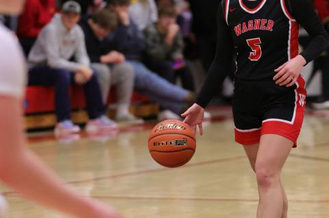 Lydia Yost brings the ball down the court.PHOTOS BY BARB PECHOUS 'Keep putting in the time and working hard!' - Coach Michael Koupal
