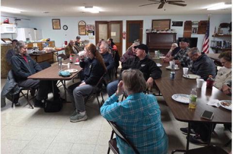 Randy Milne, President of the Bon Homme Chapter, presents Frank Bult a gift certificate in appreciation for his hours of support that he gives to the club.