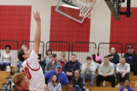 Ky Arpan with a two shot attempt against a tough Avon defense.