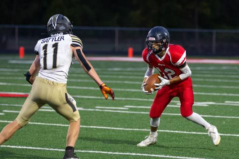 RAIDERS FALL TO TRAPPERS IN HOMECOMING GAME