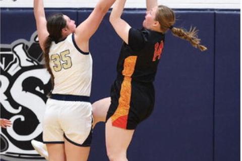 Alexis Vanderlei drives inside and shoots for 2.