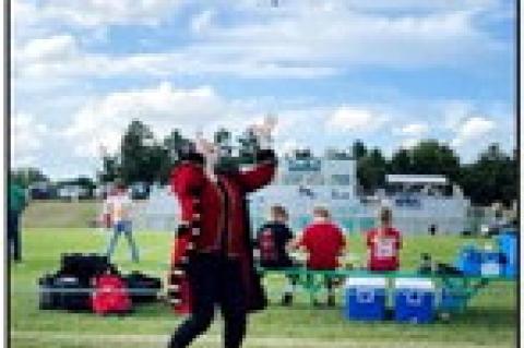 PIRATE MASCOT, ASHLEY TOLSMA THROWING SOME SCHOOL SPIRIT AT COLOME.