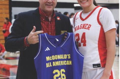 Ashlyn Koupal was presented with her McDonald's All-American jersey during Friday night's game. Photos by Barb Pechous
