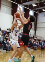 #2 Jesse Zephier with the block. Photos by Barb Pechous